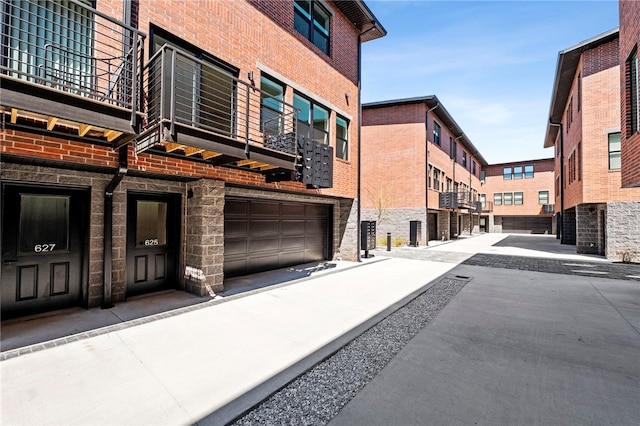 view of building exterior with an attached garage