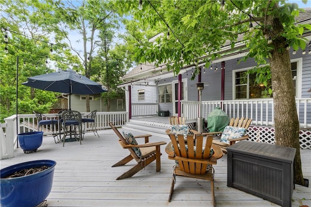 42 Vaughn St, Eureka Springs, AR 72632 - wooden terrace with outdoor dining space