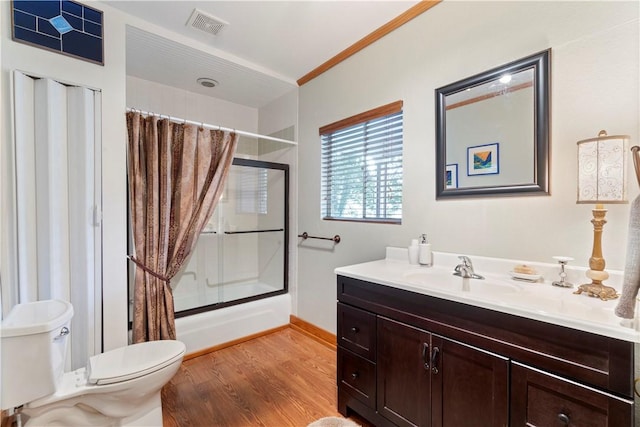 42 Vaughn St, Eureka Springs, AR 72632 - bathroom with vanity, toilet, wood finished floors, shower / bath combo, and baseboards