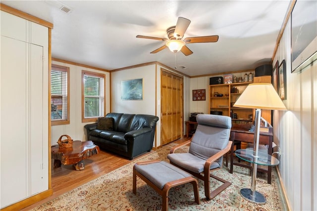 42 Vaughn St, Eureka Springs, AR 72632 - living room with wood finished floors and a ceiling fan