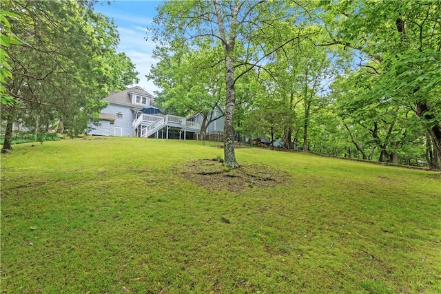 42 Vaughn St, Eureka Springs, AR 72632 - view of grassy yard with a wooden deck and stairway