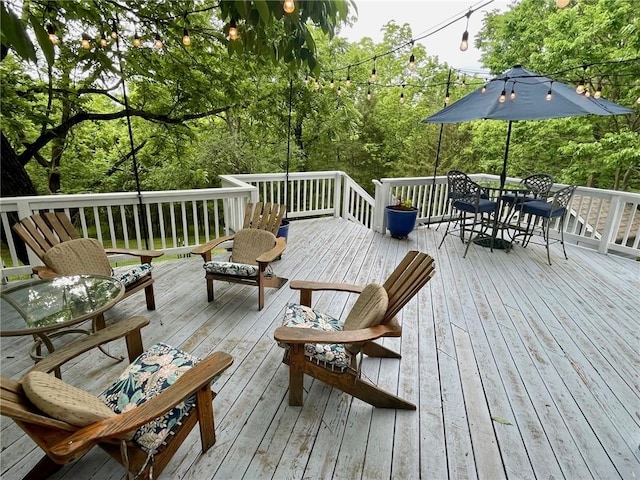 42 Vaughn St, Eureka Springs, AR 72632 - wooden terrace featuring outdoor dining area