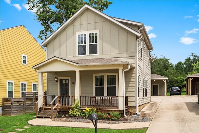 328 Martin Luther King Jr Blvd, Fayetteville, AR 72701 - view of front facade featuring board and batten siding and a porch