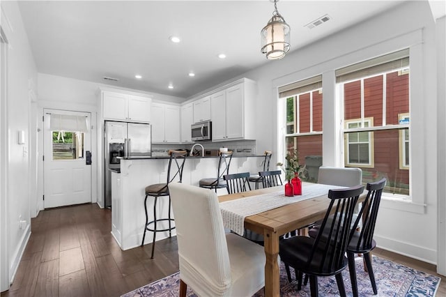328 Martin Luther King Jr Blvd, Fayetteville, AR 72701 - dining space featuring dark wood-style floors, healthy amount of natural light, and recessed lighting