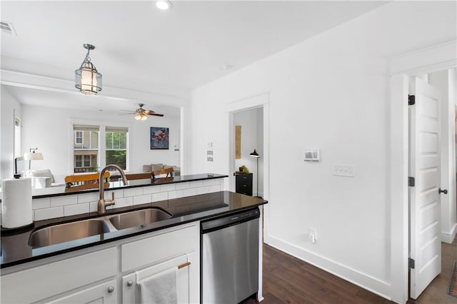 328 Martin Luther King Jr Blvd, Fayetteville, AR 72701 - kitchen featuring dishwasher, dark countertops, a ceiling fan, white cabinetry, and dark wood finished floors