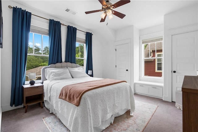328 Martin Luther King Jr Blvd, Fayetteville, AR 72701 - bedroom featuring light carpet and a ceiling fan