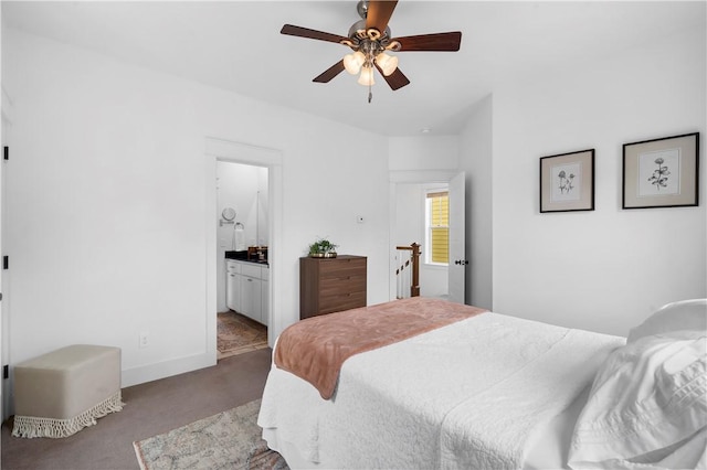 328 Martin Luther King Jr Blvd, Fayetteville, AR 72701 - carpeted bedroom with ensuite bathroom and a ceiling fan