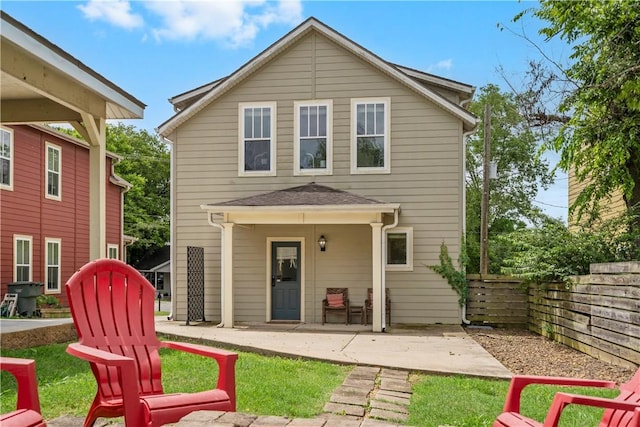 328 Martin Luther King Jr Blvd, Fayetteville, AR 72701 - back of property with a patio