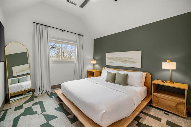 carpeted bedroom with visible vents, ceiling fan, baseboards, and lofted ceiling