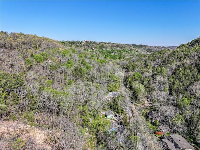 drone / aerial view with a view of trees