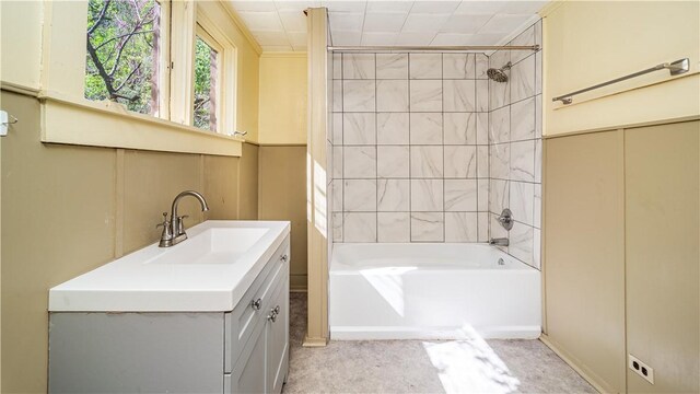 bathroom featuring bathing tub / shower combination and vanity