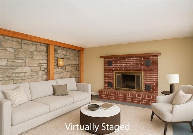 living room with a fireplace and carpet floors