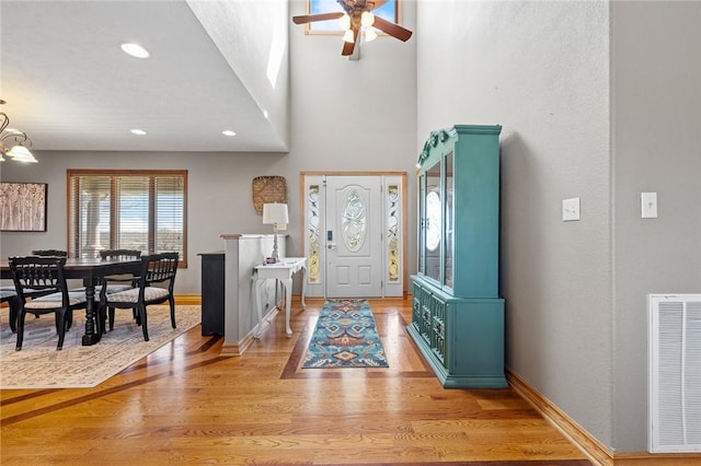 9961 Rainbow Ridge Rd, Omaha, AR 72662 - entryway with visible vents, light wood-style flooring, a ceiling fan, and baseboards
