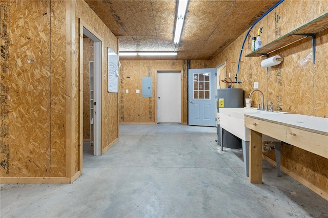 9961 Rainbow Ridge Rd, Omaha, AR 72662 - interior space featuring electric panel, water heater, a workshop area, and a sink