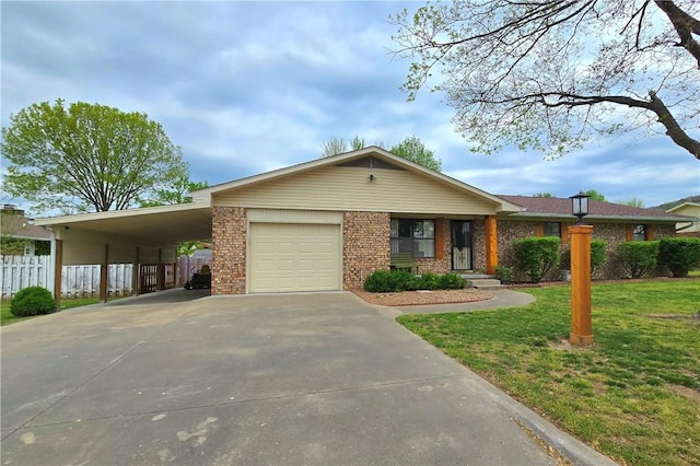 single story home with fence, concrete driveway, brick siding, a front lawn, and an attached carport