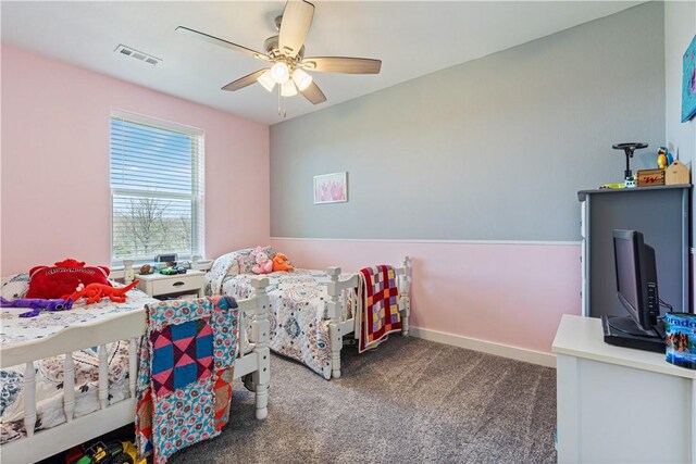 bedroom featuring visible vents, ceiling fan, baseboards, and carpet floors