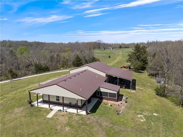 drone / aerial view with a forest view