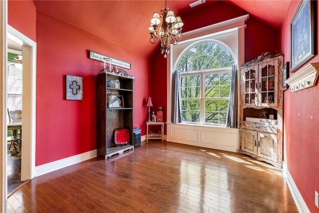3512 Hamm Ln, Springdale, AR 72762 - unfurnished dining area with lofted ceiling, a chandelier, and wood-type flooring