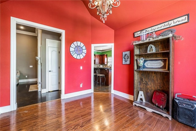 3512 Hamm Ln, Springdale, AR 72762 - dining room with a chandelier, wood finished floors, baseboards, and high vaulted ceiling