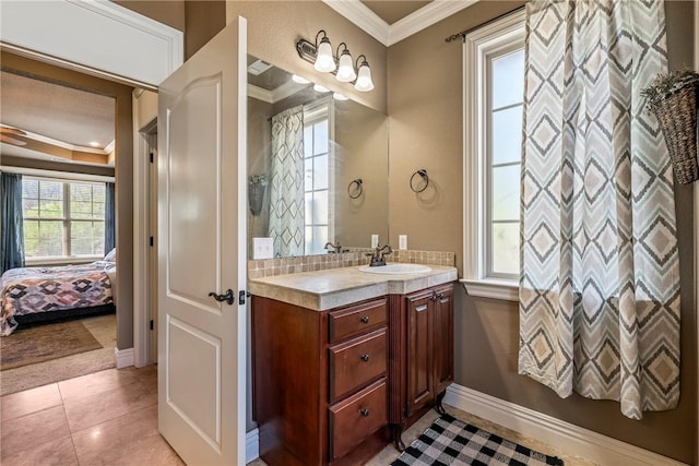3512 Hamm Ln, Springdale, AR 72762 - ensuite bathroom featuring ornamental molding, vanity, baseboards, and tile patterned floors