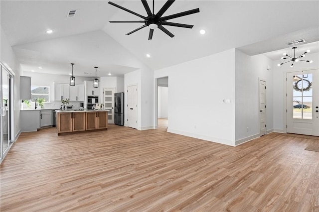 1900 Yellowstone Dr, Barling, AR 72923 - unfurnished living room featuring light wood-style flooring, visible vents, and recessed lighting