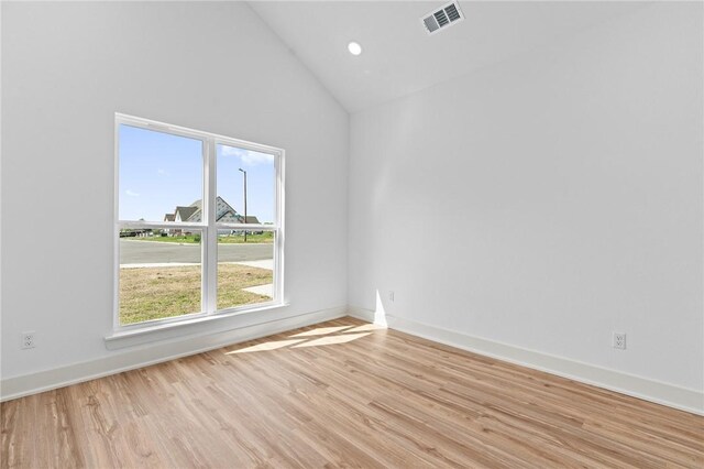 1900 Yellowstone Dr, Barling, AR 72923 - spare room with light wood finished floors, visible vents, and baseboards