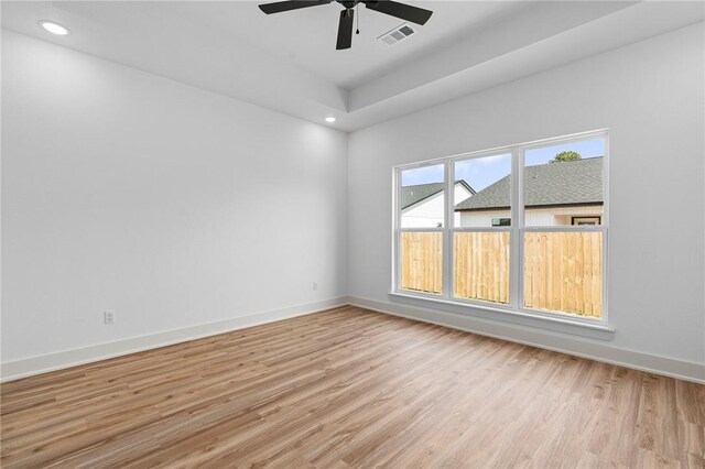 1900 Yellowstone Dr, Barling, AR 72923 - unfurnished room with visible vents, baseboards, light wood-type flooring, and ceiling fan