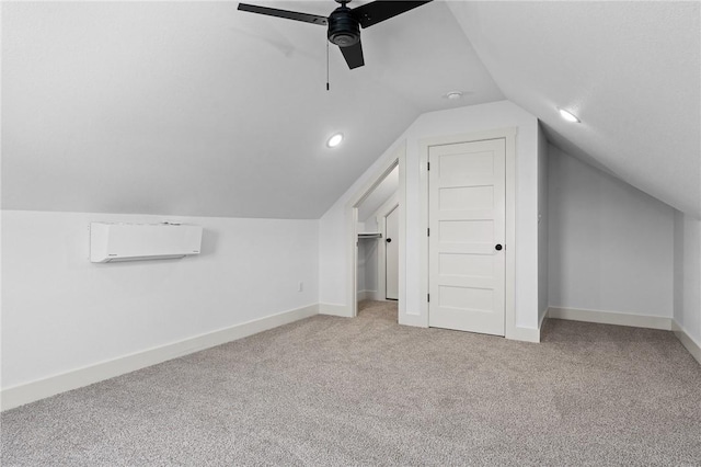 1900 Yellowstone Dr, Barling, AR 72923 - additional living space with baseboards, an AC wall unit, carpet flooring, a ceiling fan, and lofted ceiling