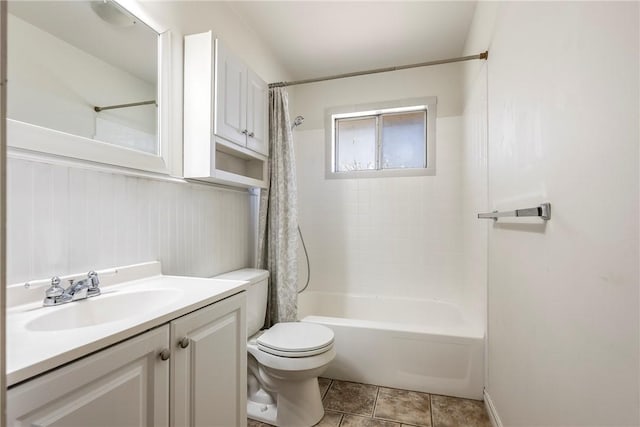 bathroom with toilet, vanity, and shower / tub combo with curtain