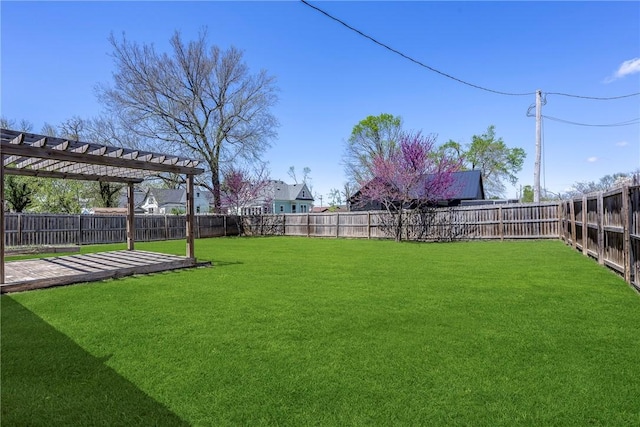 view of yard with a fenced backyard and a pergola