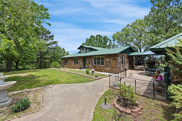 9417 Puddin Ridge Rd, Ozark, AR 72949 - view of front of home featuring a front lawn, stone siding, a gazebo, a metal roof, and a patio area