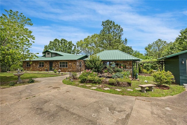 9417 Puddin Ridge Rd, Ozark, AR 72949 - single story home featuring stone siding, a gazebo, and a metal roof