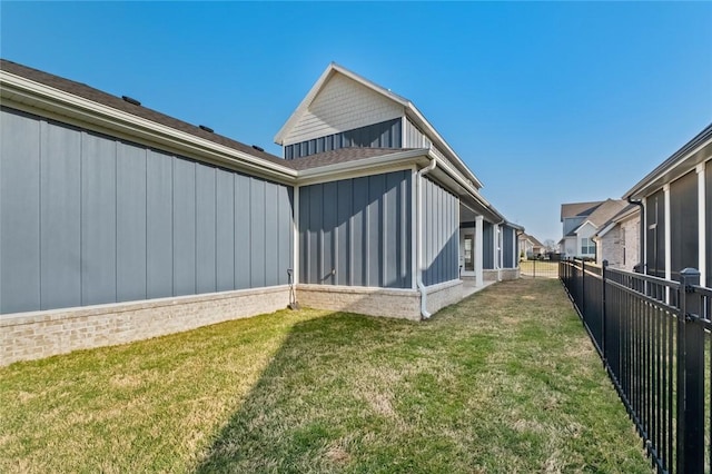 back of property with board and batten siding