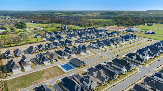 aerial overview of property's location with nearby suburban area