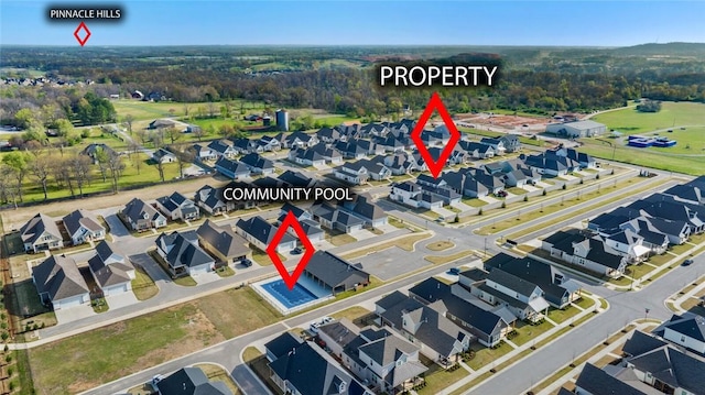 view of property location featuring nearby suburban area