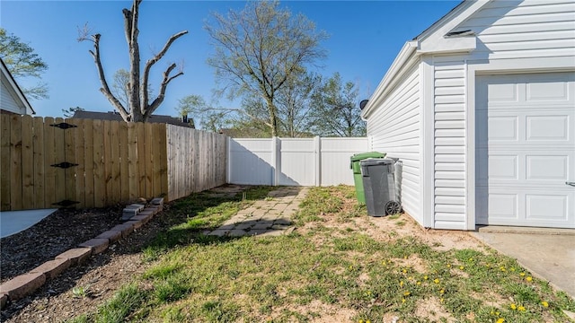 2416 Mulberry St, Rogers, AR 72758 - view of yard featuring a garage and fence