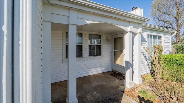 2416 Mulberry St, Rogers, AR 72758 - entrance to property featuring a chimney