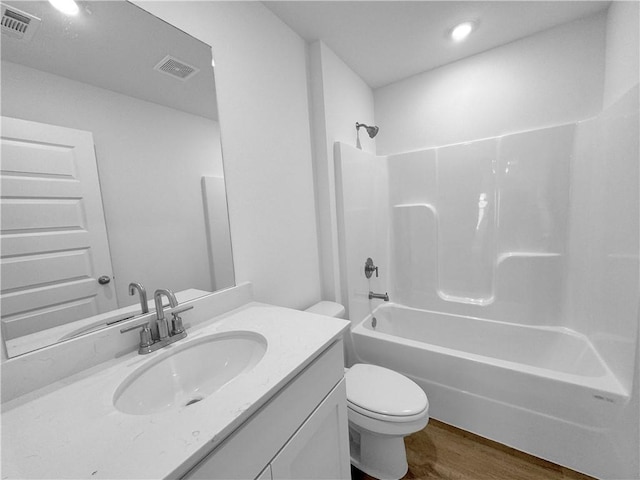 429 W Gosling Isle, Farmington, AR 72730 - bathroom with toilet, wood finished floors, bathtub / shower combination, and visible vents