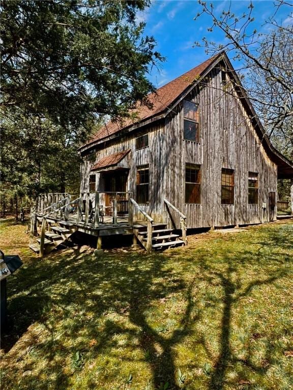 23045 Liberty Trl, Natural Dam, AR 72948 - rear view of house with a yard and a wooden deck
