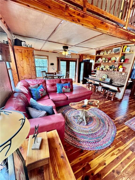 23045 Liberty Trl, Natural Dam, AR 72948 - living room featuring hardwood / wood-style flooring and a ceiling fan