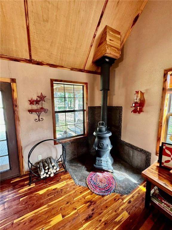 23045 Liberty Trl, Natural Dam, AR 72948 - living room with plenty of natural light, wood finished floors, and lofted ceiling