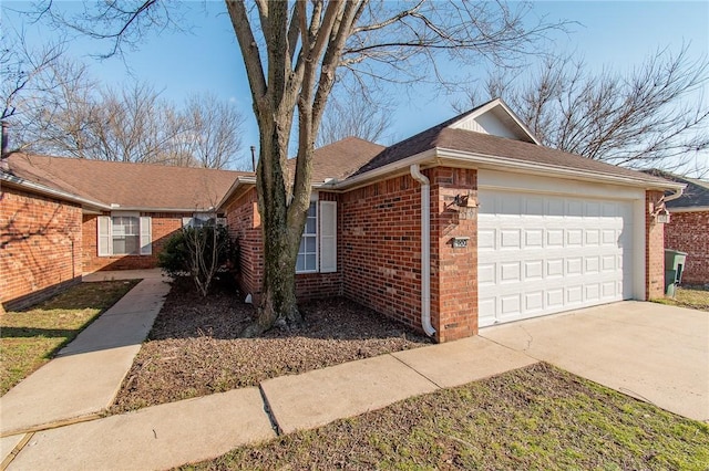 ranch-style house with brick siding, roof with shingles, a garage, and concrete driveway
