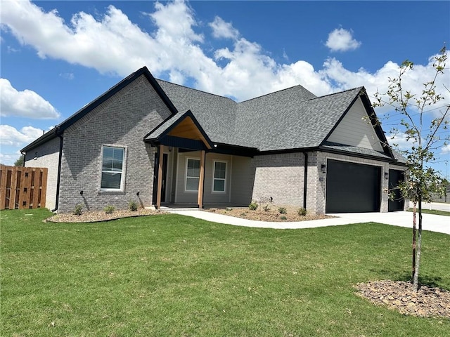 7919 Via Roma Ave, Springdale, AR 72762 - view of front of house featuring brick siding, driveway, roof with shingles, and a garage