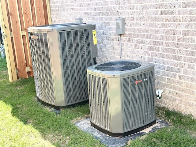 7919 Via Roma Ave, Springdale, AR 72762 - exterior view of cooling unit and brick siding