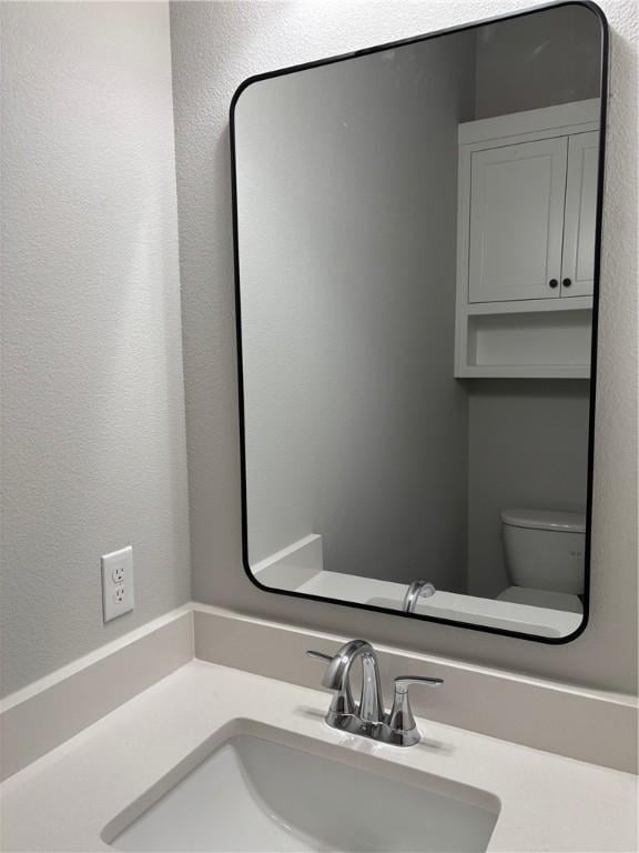 7919 Via Roma Ave, Springdale, AR 72762 - half bathroom featuring toilet and vanity
