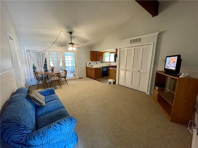 2509 Bradley Ln, Russellville, AR 72801 - living area featuring visible vents, a ceiling fan, lofted ceiling, and light colored carpet