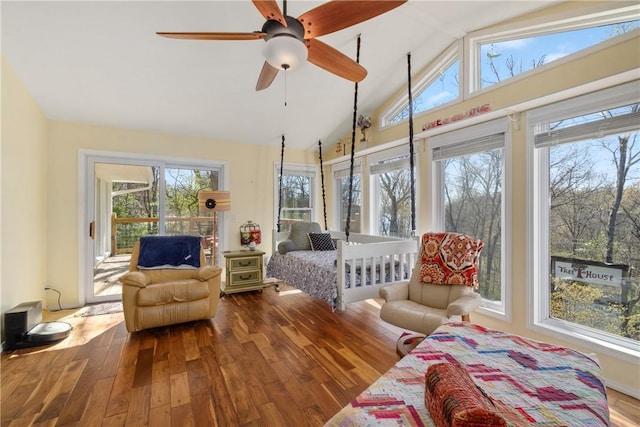 30 Strichen Dr, Bella Vista, AR 72715 - bedroom with hardwood / wood-style floors, access to exterior, and multiple windows