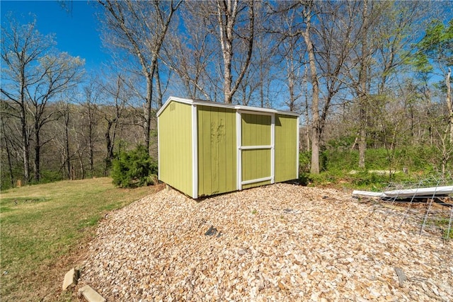 30 Strichen Dr, Bella Vista, AR 72715 - view of shed featuring a wooded view