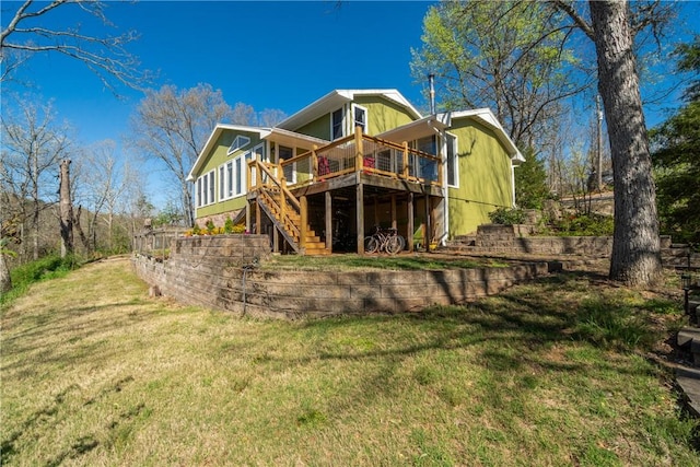30 Strichen Dr, Bella Vista, AR 72715 - back of house with stairs, a wooden deck, and a lawn