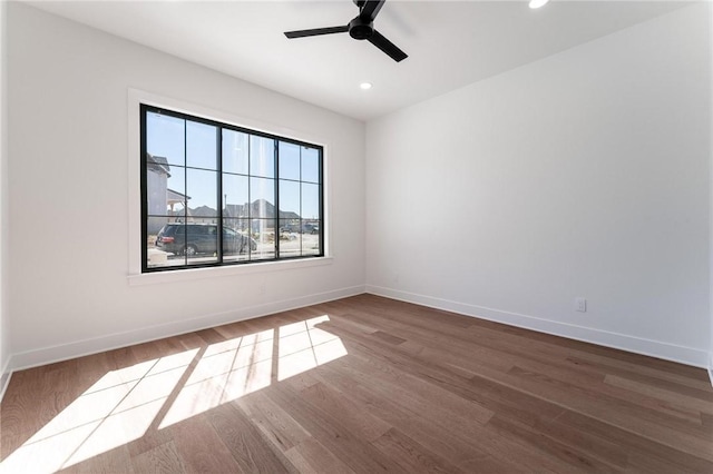 3601 Beaverhead, Bentonville, AR 72712 - spare room with ceiling fan, recessed lighting, wood finished floors, and baseboards